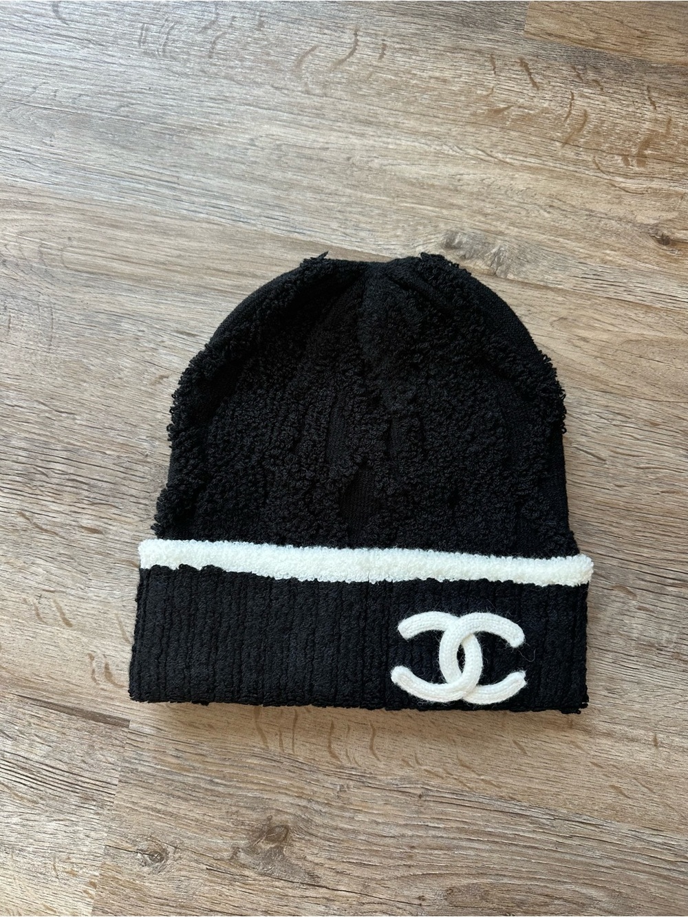 CHANEL Black Beanie with White Trim and CC Logo